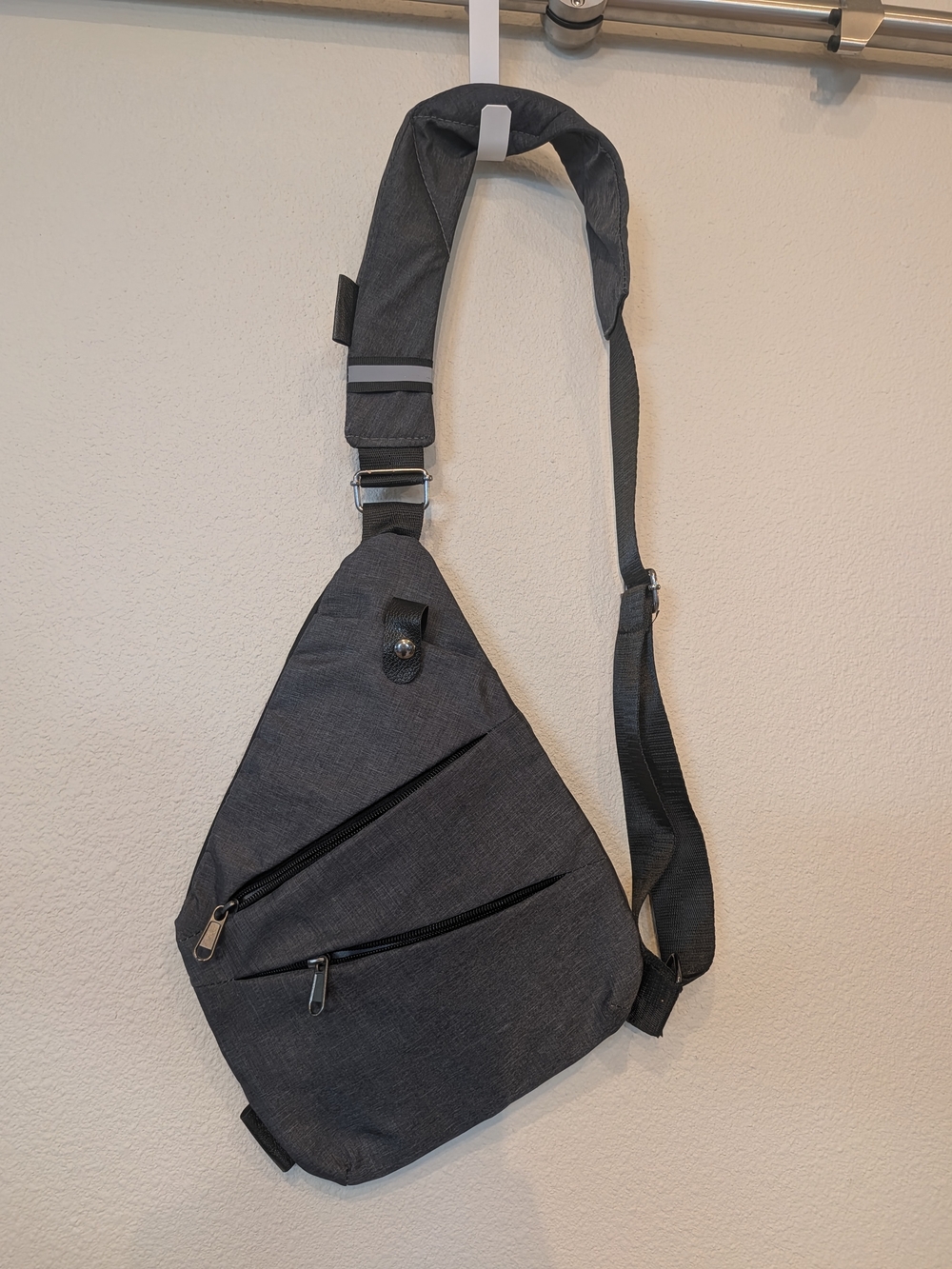 Unisex slim anti-theft sling crossbody chest pack in heathered charcoal gray